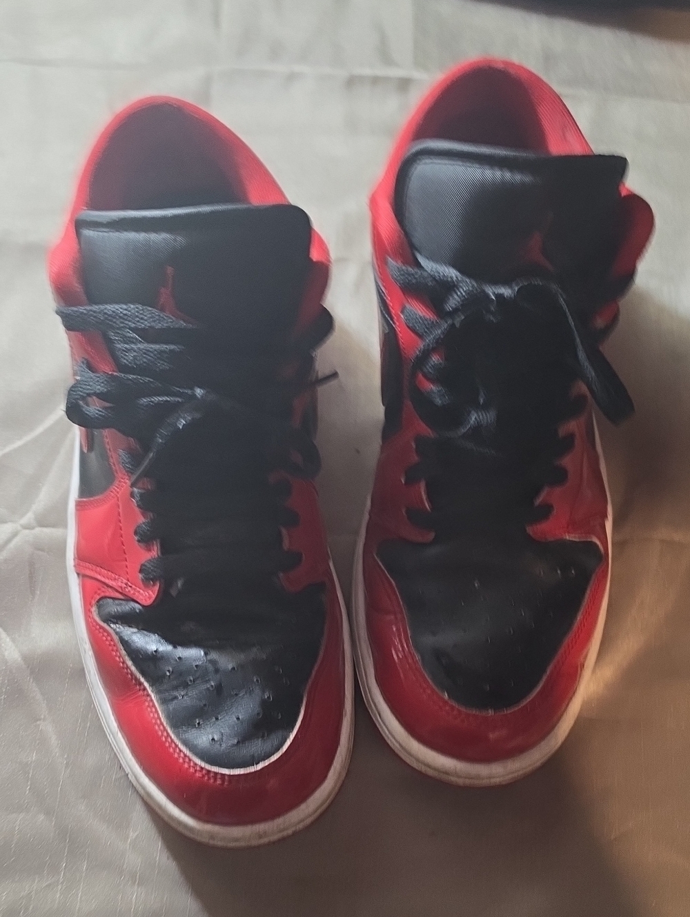 Jordan Red and Black High-Top Sneaker Tongue Label Detail